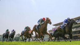 Isaac Shelby (red hat) went close in the French 2,000 Guineas (Scoopdyga/France Galop)