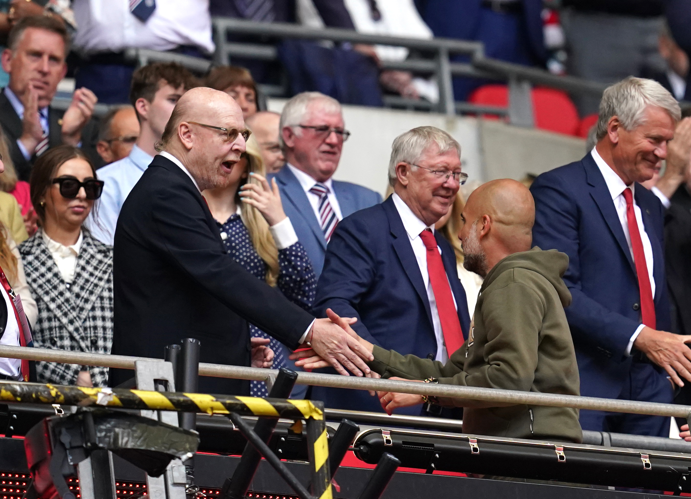 Avram Glazer, left, pictured alongside former Manchester United manager Sir Alex Ferguson at last Saturday's FA Cup final