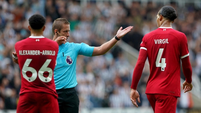 Liverpool captain Virgil van Dijk initially refused to leave the pitch after he was shown a red card (Owen Humphreys/PA)