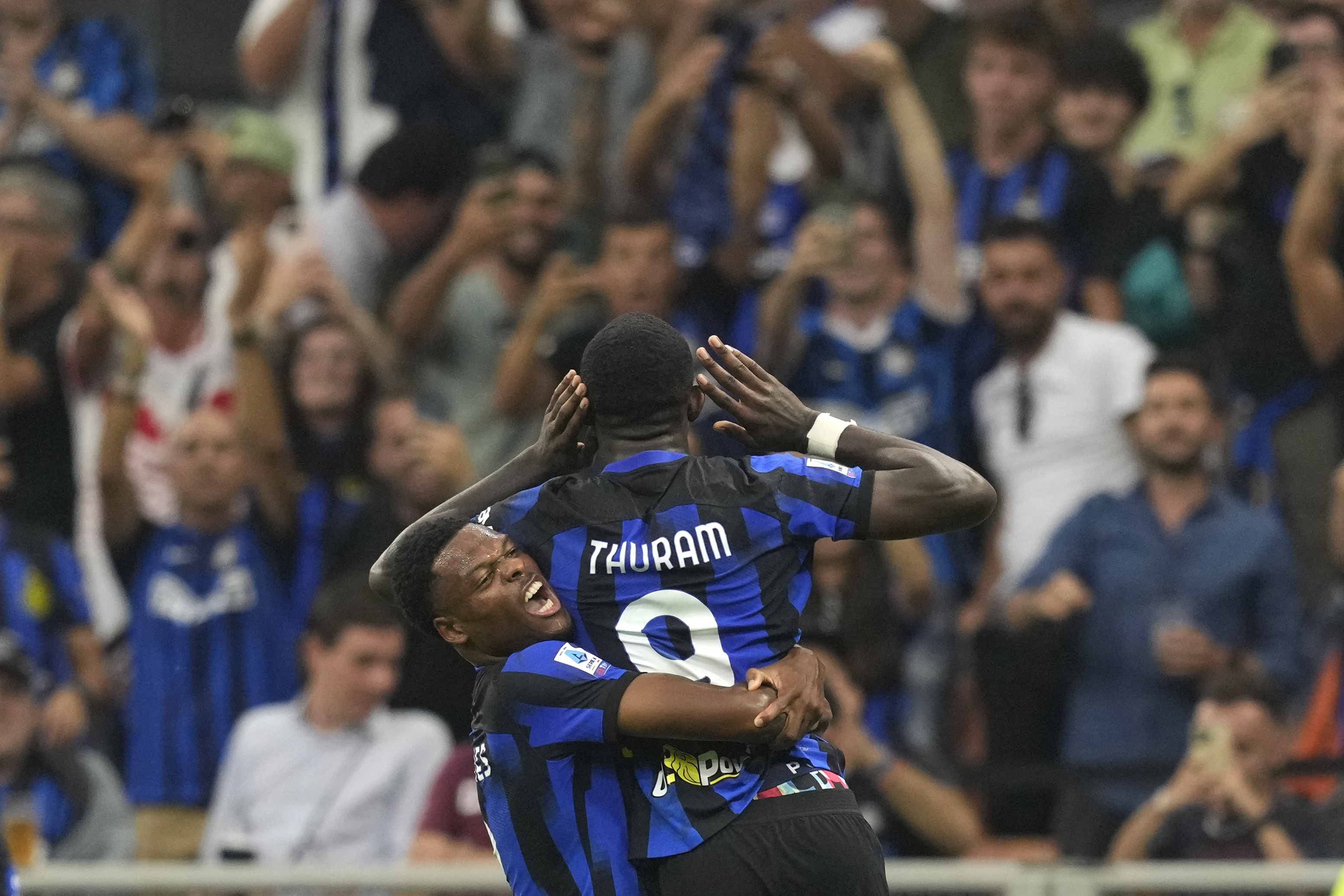 Inter Milan’s Marcus Thuram celebrates