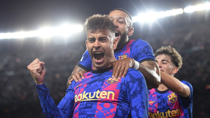 Barcelona players celebrate Gerard Pique's goal against Dynamo Kiev