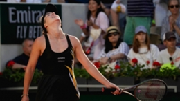 Elina Svitolina soaks in her memorable victory (Christophe Ena/AP)