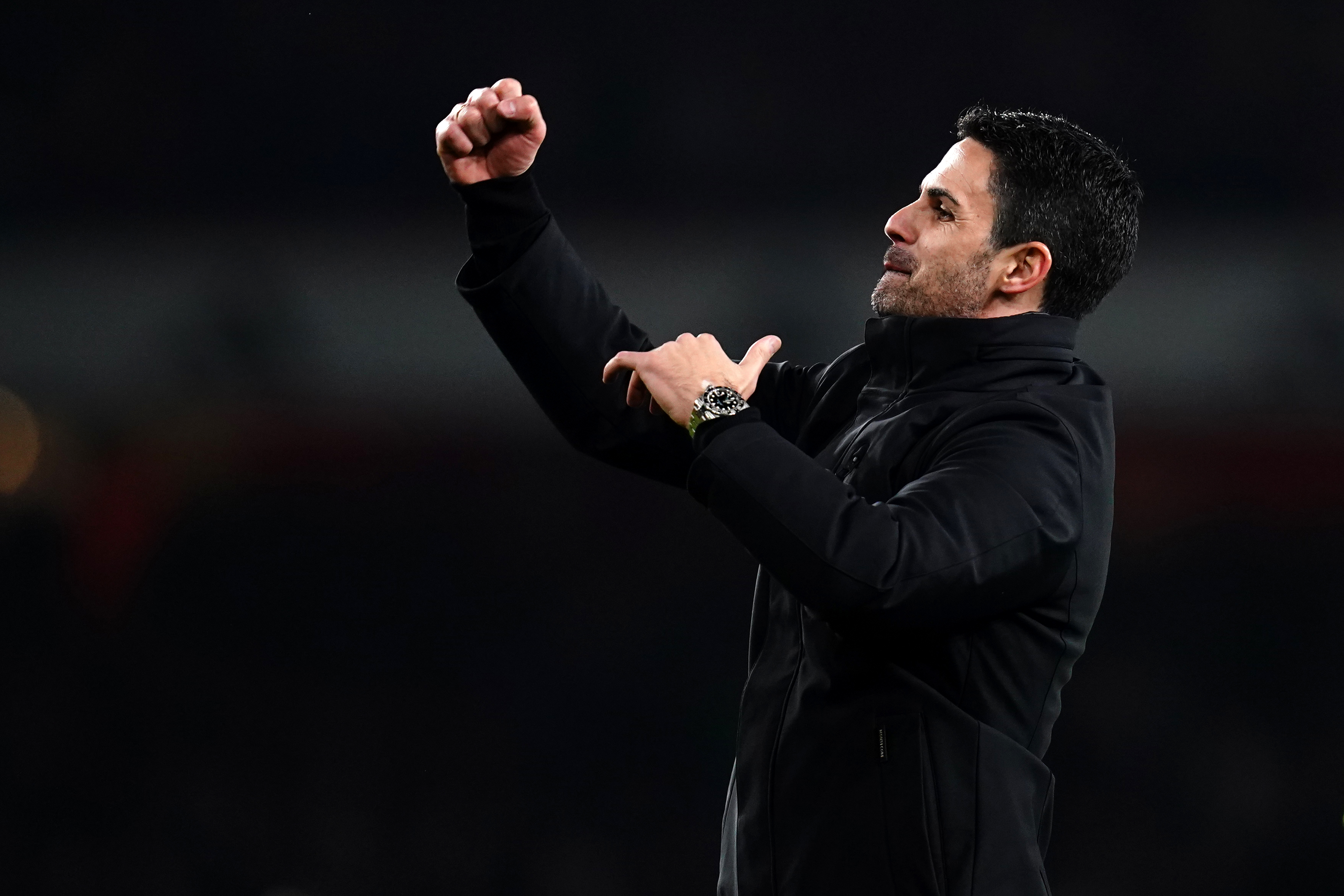 Mikel Arteta celebrates with the Arsenal fans after the win over Brentford