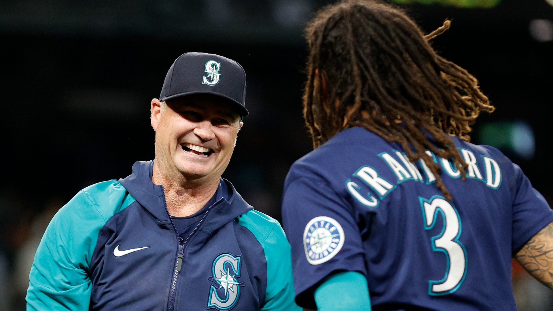 Scott Servais celebrates J.P. Crawford's walk-off single against the Rangers