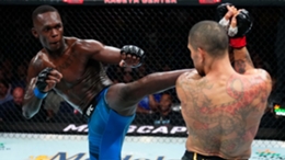 Israel Adesanya kicks Alex Pereira in the UFC middleweight championship fight during UFC 287