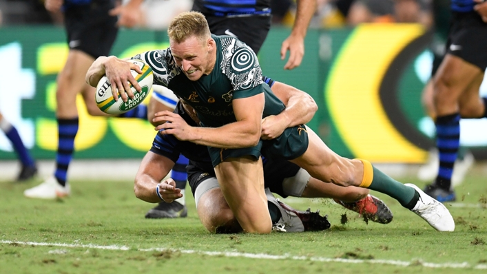 Reece Hodge scores Australia's opening try against Argentina