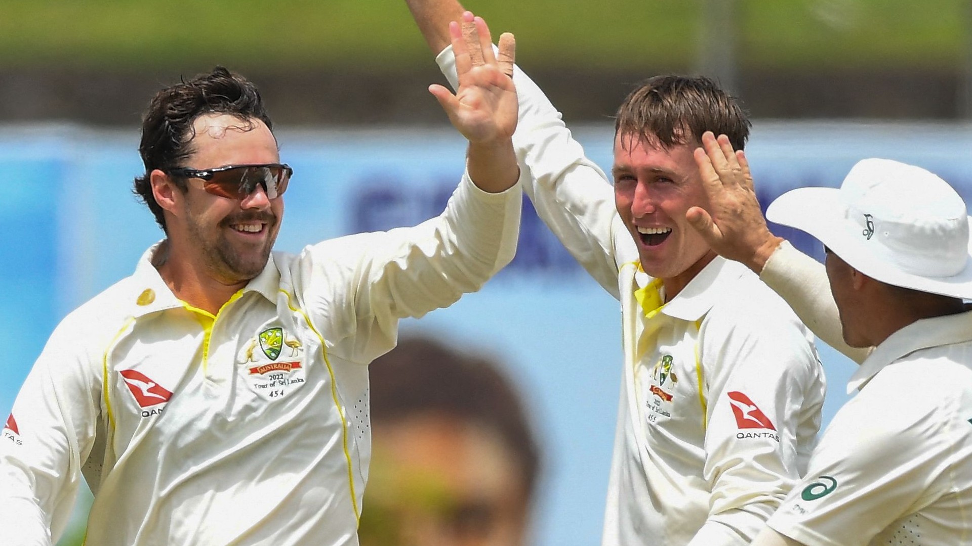 Travis Head (left) took 4-10 as Australia thrashed Sri Lanka