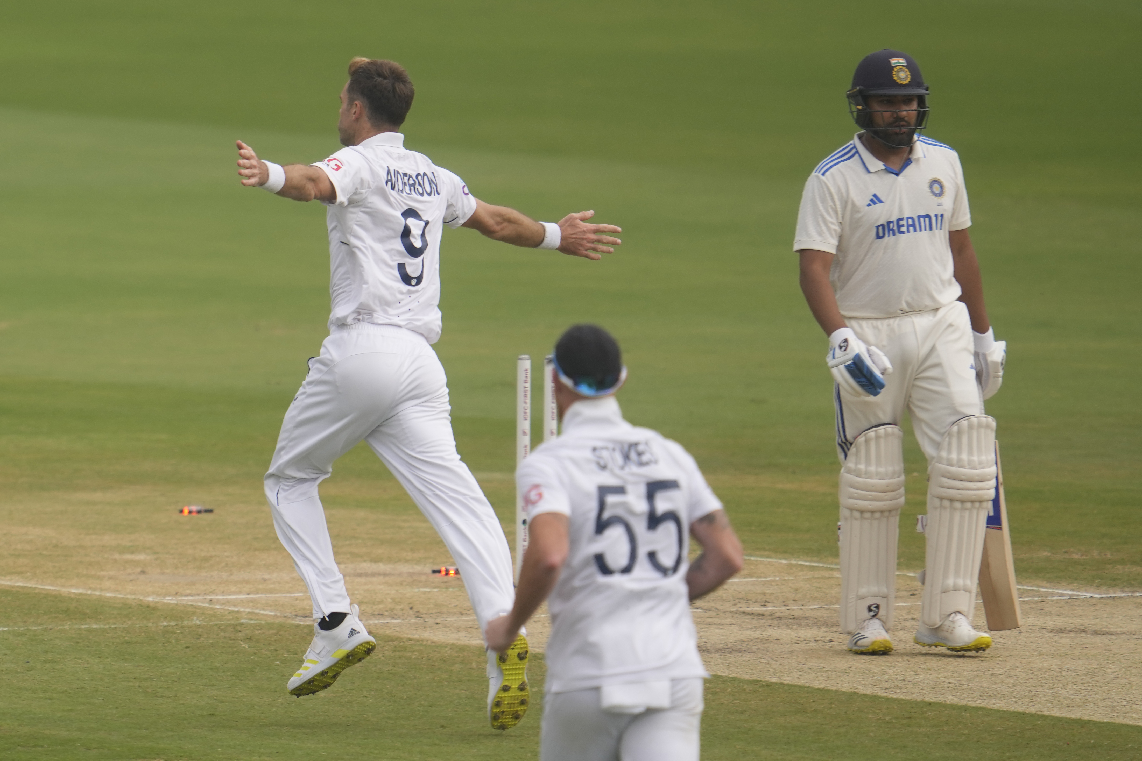 England’s James Anderson (left) celebrates the wicket of India’s captain Rohit Sharma