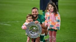 Jamison Gibson-Park celebrates Ireland's Triple Crown with his two daughters
