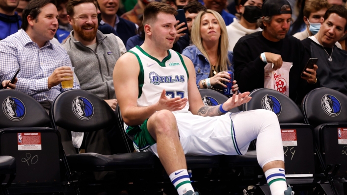 Luka Doncic watches on during the Dallas Mavericks' loss to the Brooklyn Nets
