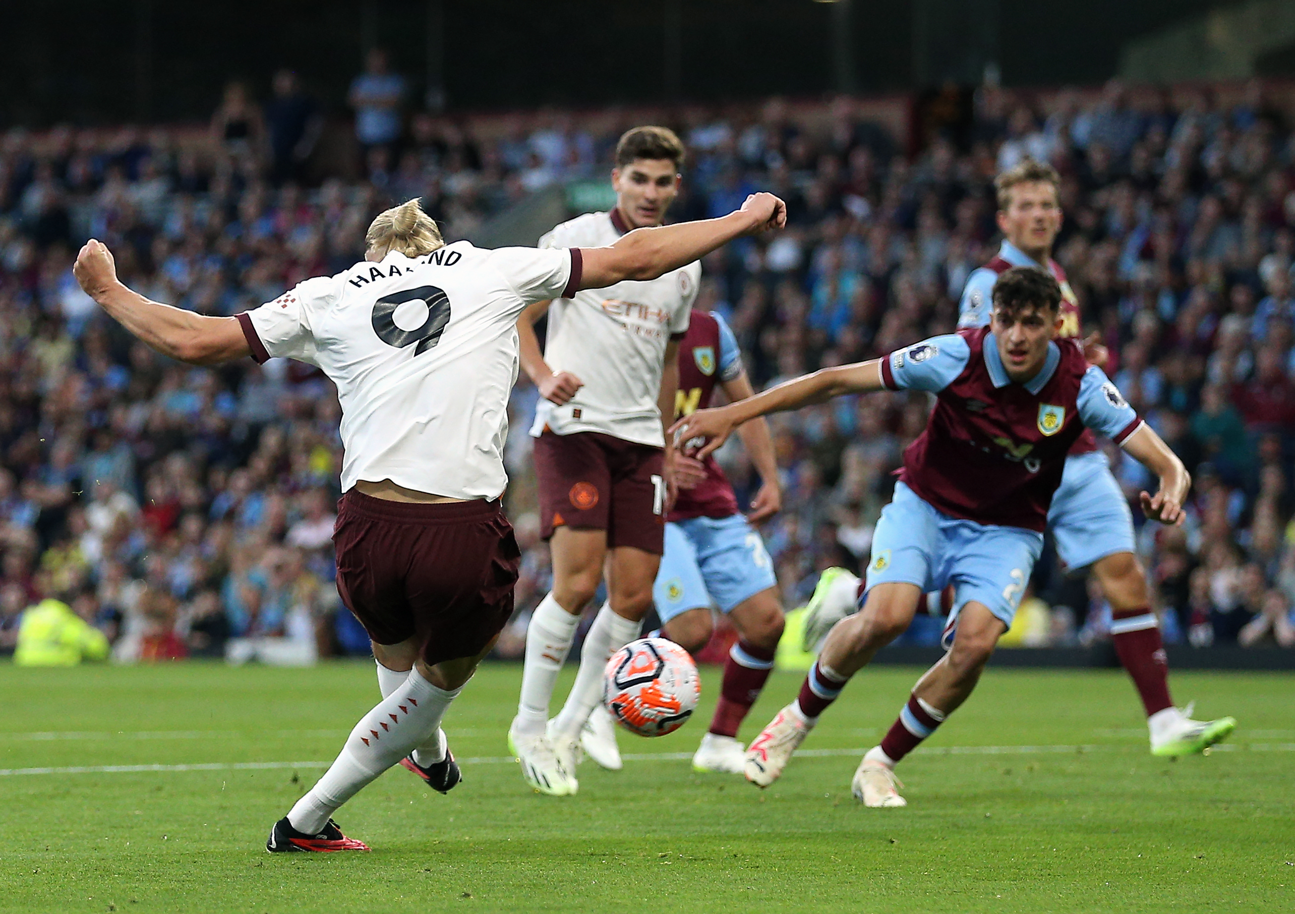 Erling Haaland, left, scores City's second goal