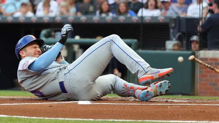 Pete Alonso of the New York Mets falls to the ground after he is hit by pitch on June 7, 2023. Alonso was pulled from the game due to injury.