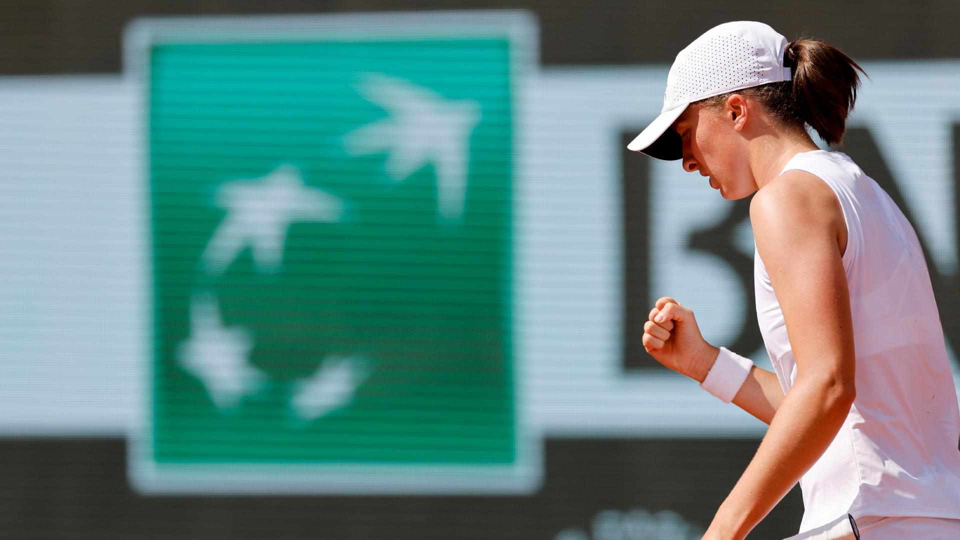 Iga Swiatek moved into round three (Jean-Francois Badias/AP)