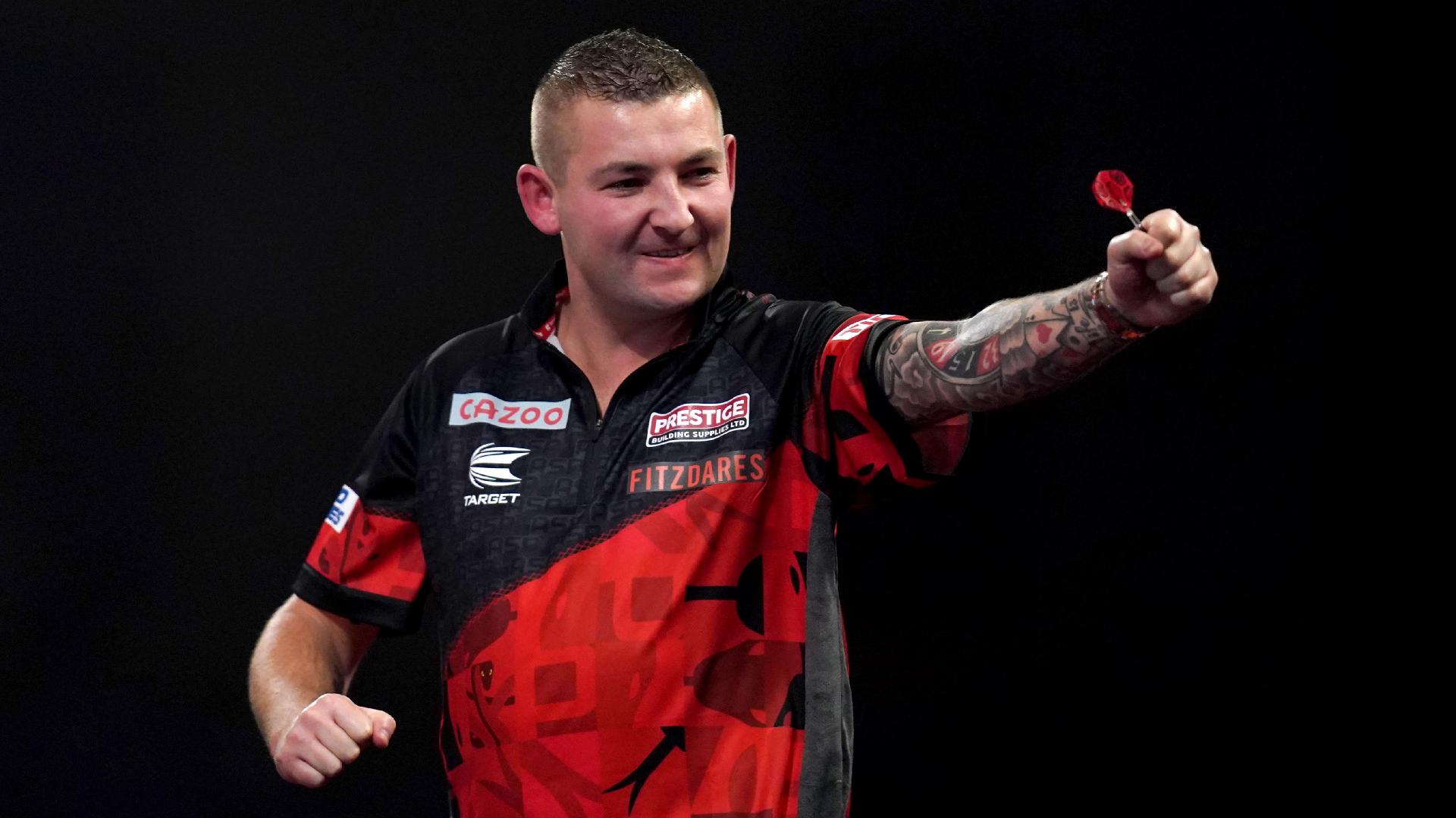 Nathan Aspinall brushed aside Jonny Clayton to win the Betfred World Matchplay title in Blackpool (John Walton/PA)