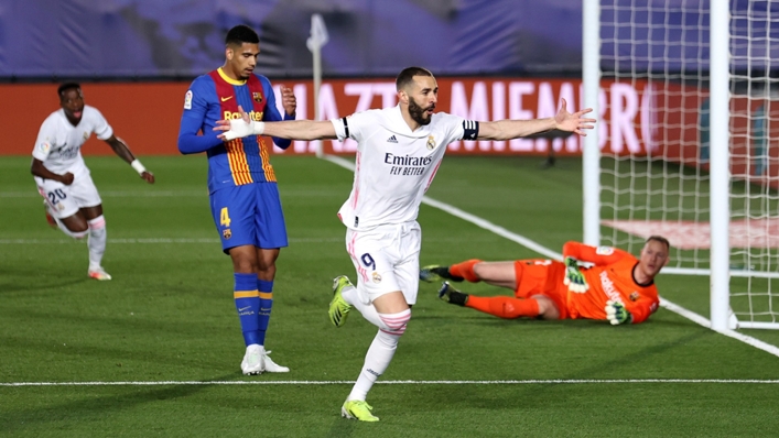 Karim Benzema celebrates a goal against Barcelona