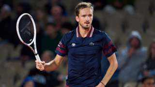 Medvedev battles into French Open second round after Koepfer triumph