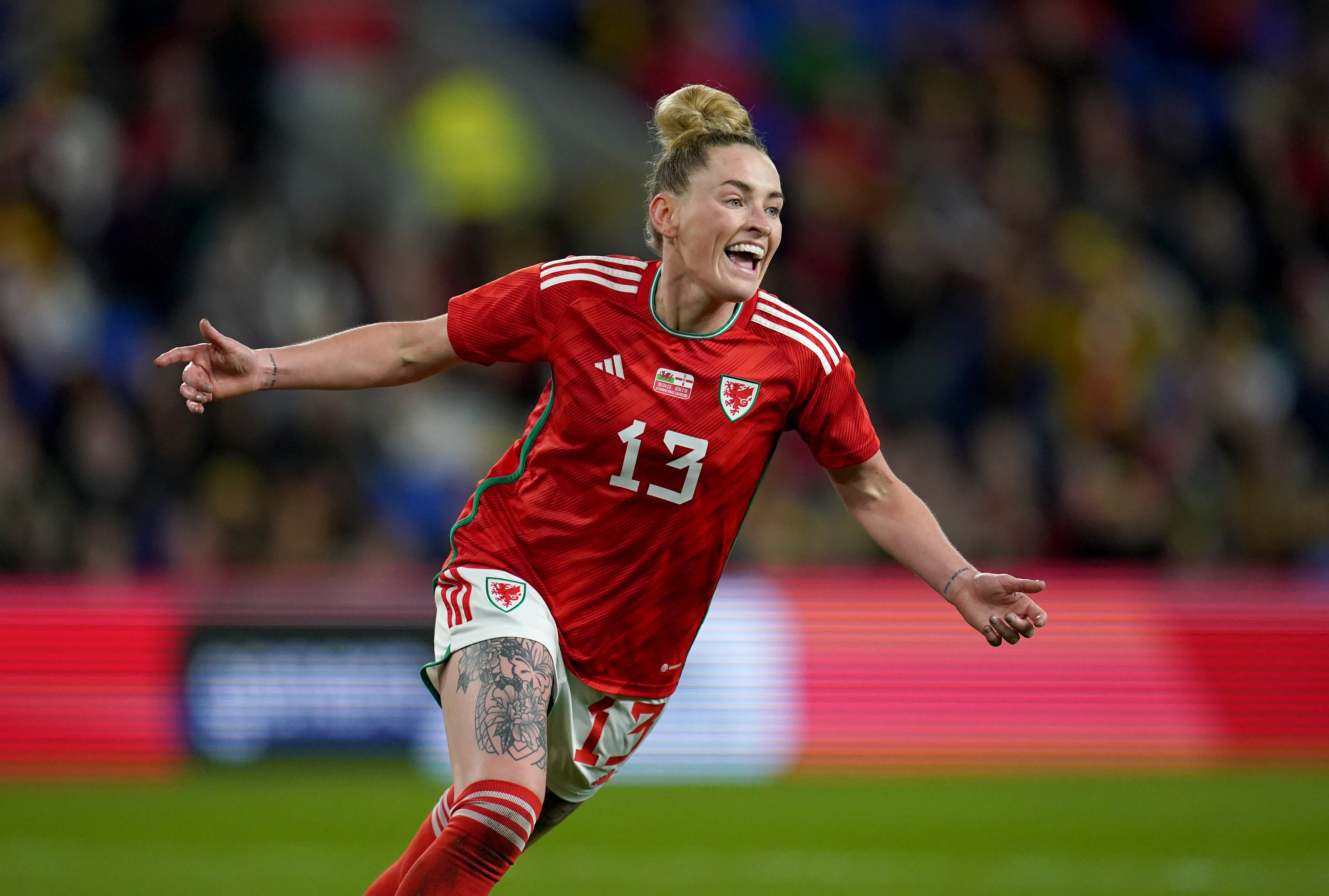 Rachel Rowe celebrates scoring for Wales