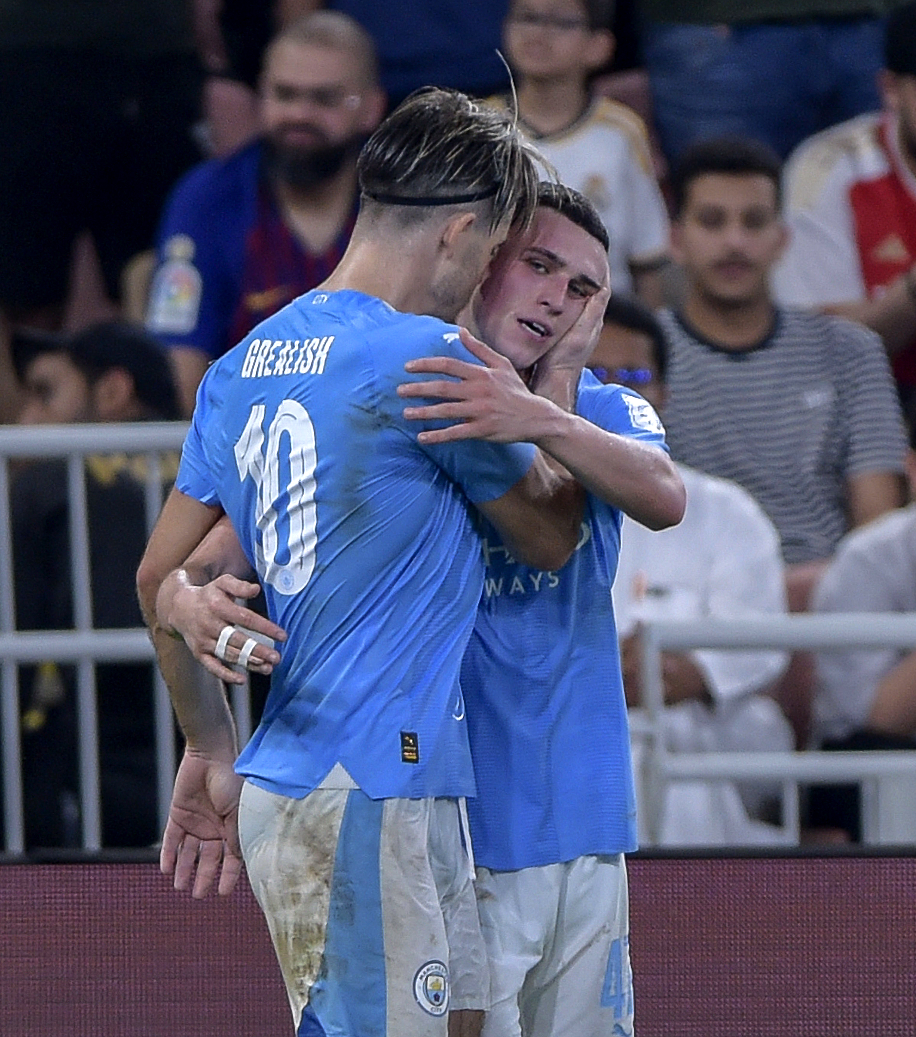 Phil Foden celebrates his goal with team-mate Jack Grealish