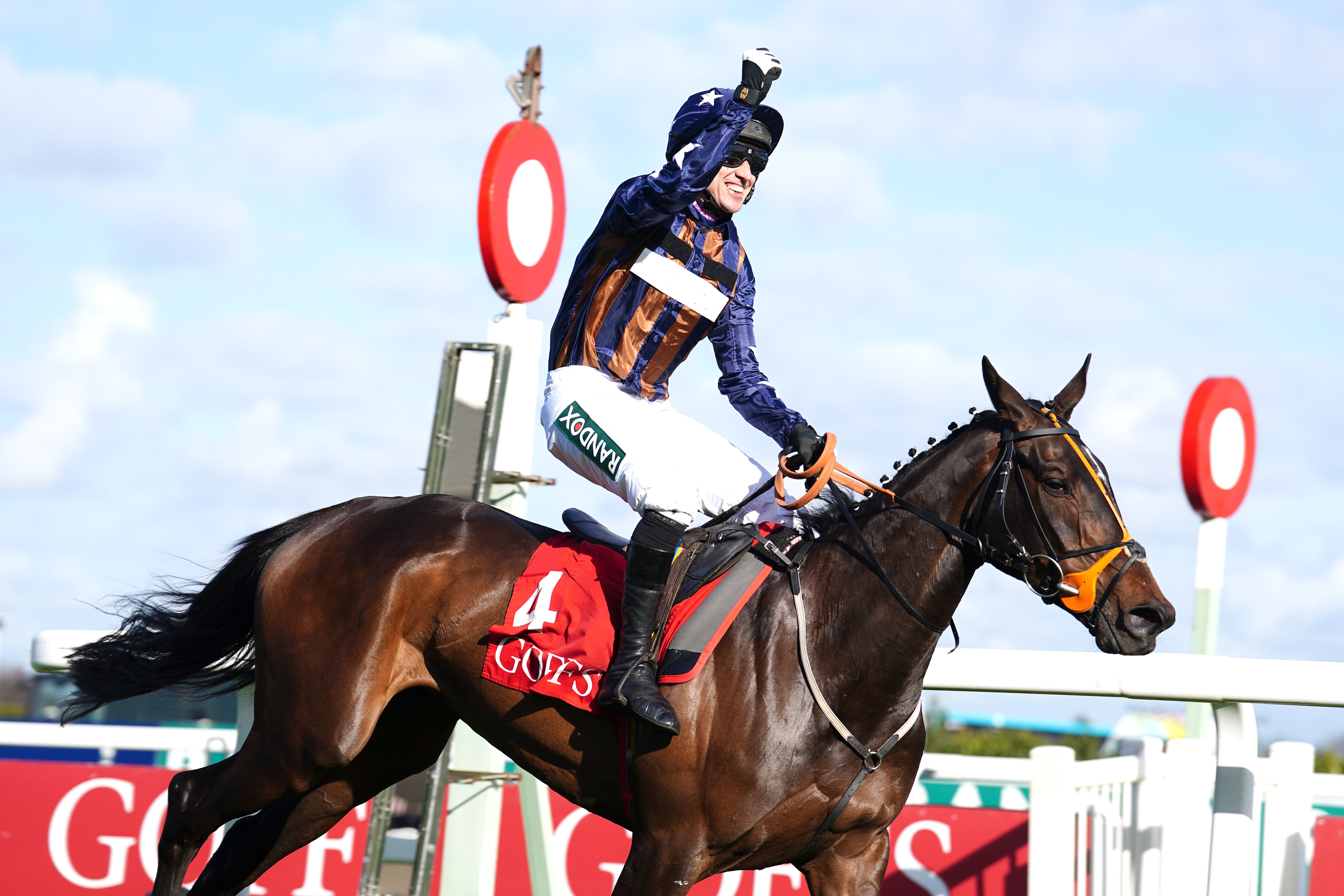 Paddy Brennan celebrates winning at Aintree aboard Dysart Enos