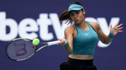 Emma Raducanu plays a forehand against Bianca Andreescu in their first round match at the Miami Open