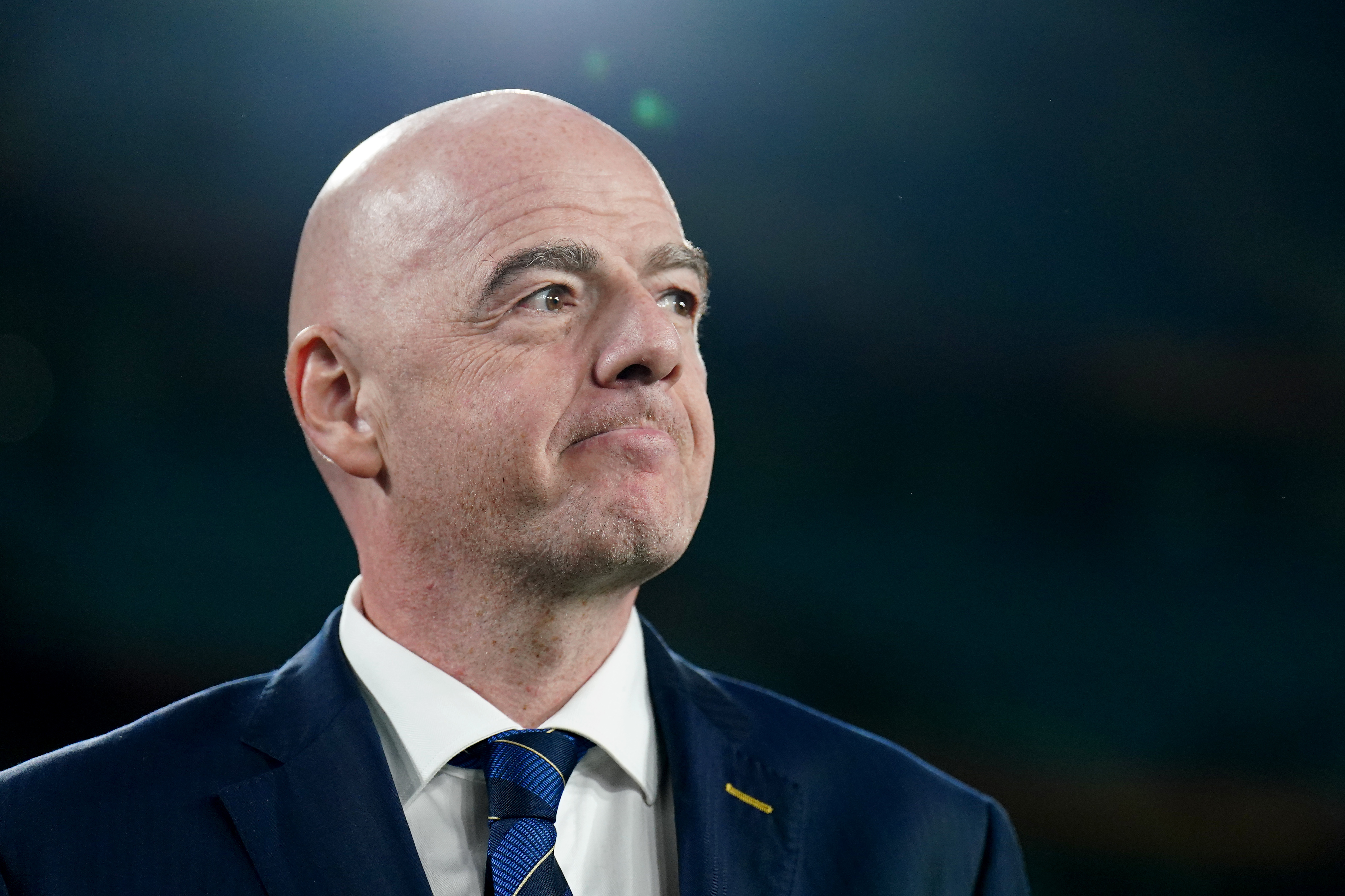 FIFA president Gianni Infantino says teams whose fans' racist behaviour forces matches to be abandoned should automatically forfeit the match in question
