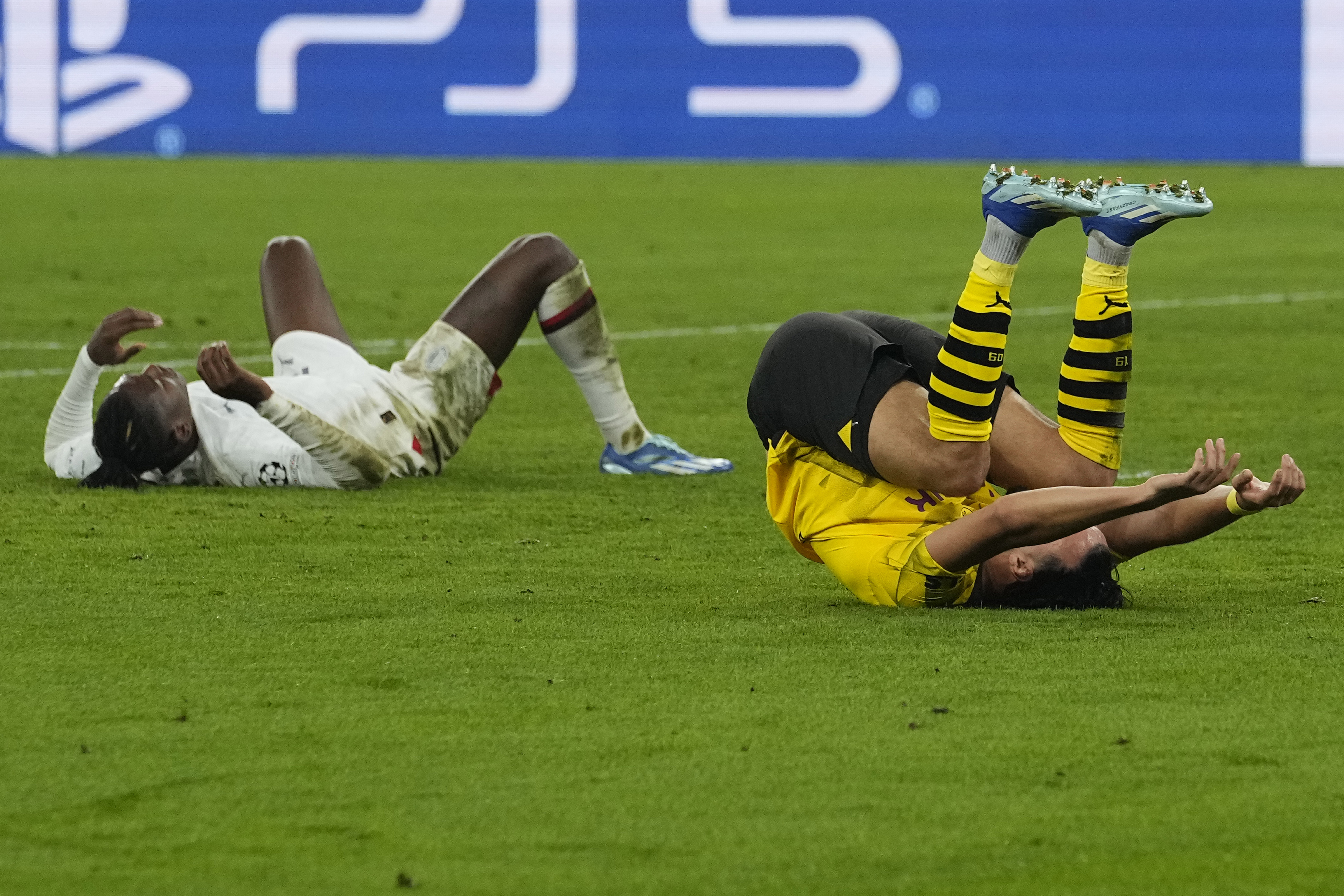Ramy Bensebaini and Rafael Leao