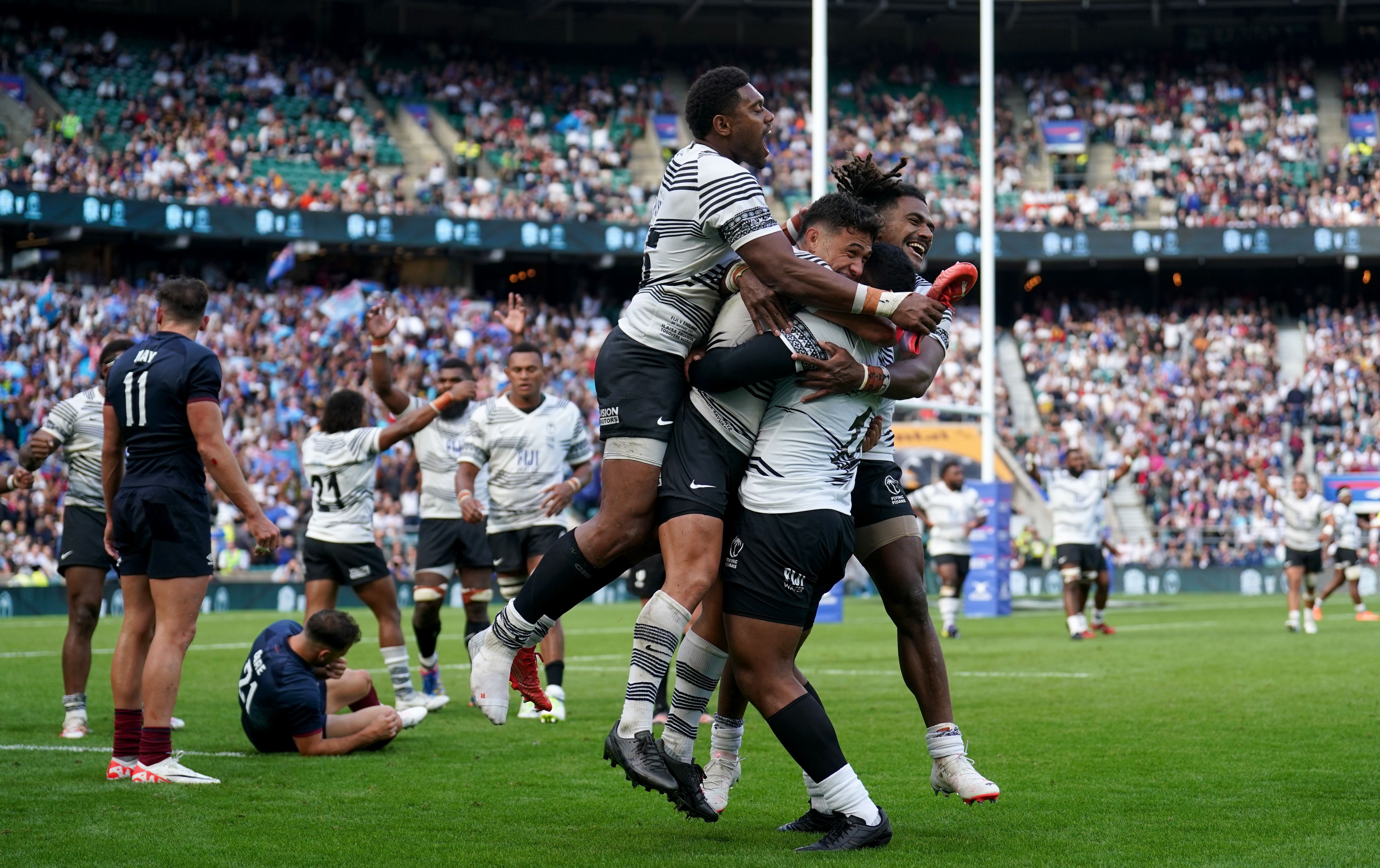 Fiji celebrate their shock rugby union victory over England at Twickenham