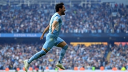 Ilkay Gundogan celebrates Manchester City's title-clinching third goal