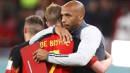 Thierry Henry embraces Kevin De Bruyne after Belgium crash out of the World Cup