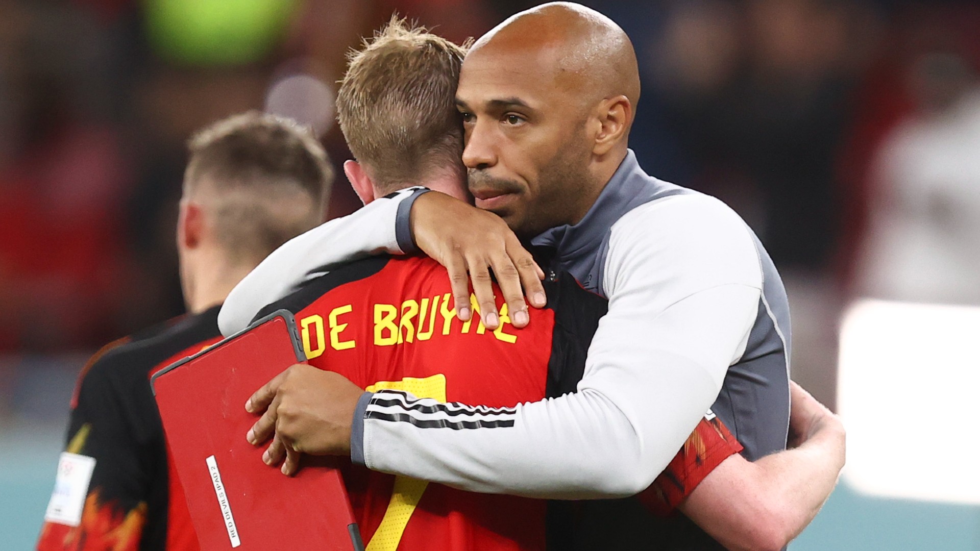 Thierry Henry embraces Kevin De Bruyne after Belgium crash out of the World Cup
