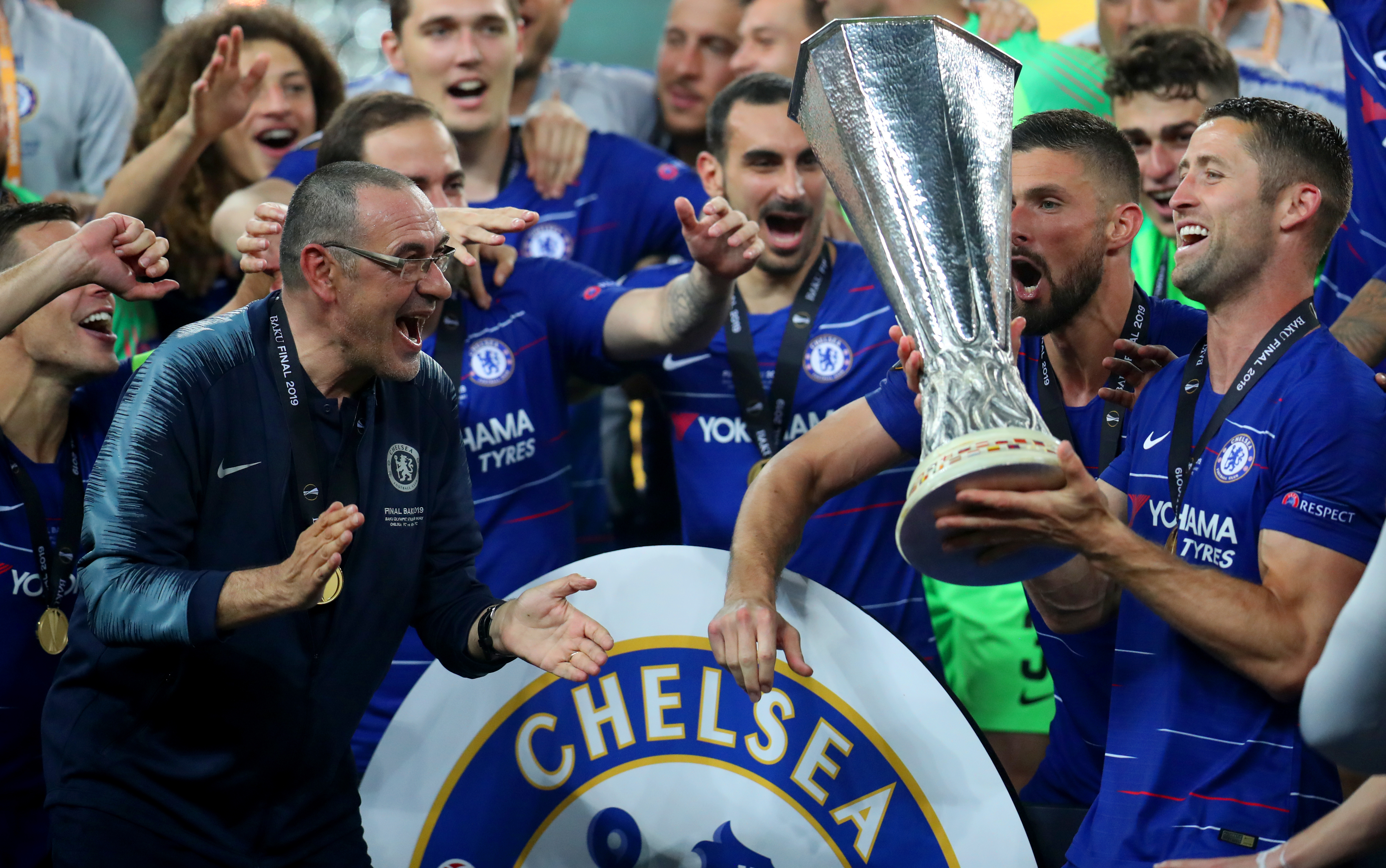 Sarri, left, won the Europa League as Chelsea boss in 2019