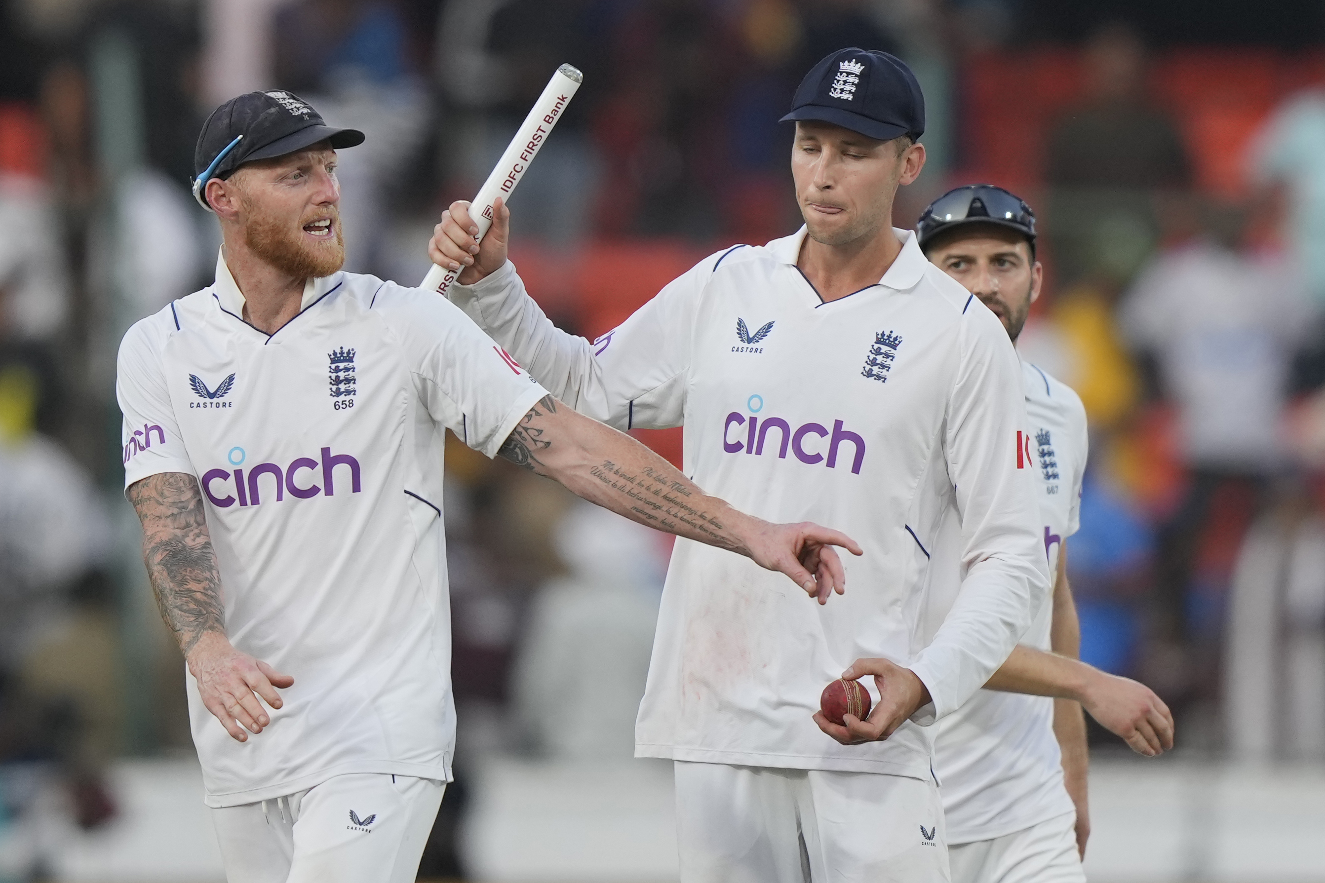 England’s captain Ben Stokes, left, was praised for his handling of Hartley's tough introduction to Test cricket (Manesh Kumar A/AP)