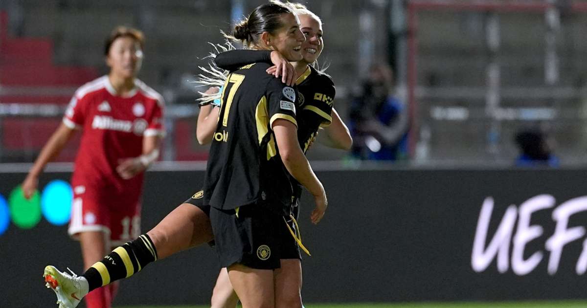 Manchester City players celebrate during the Women's Champions League match