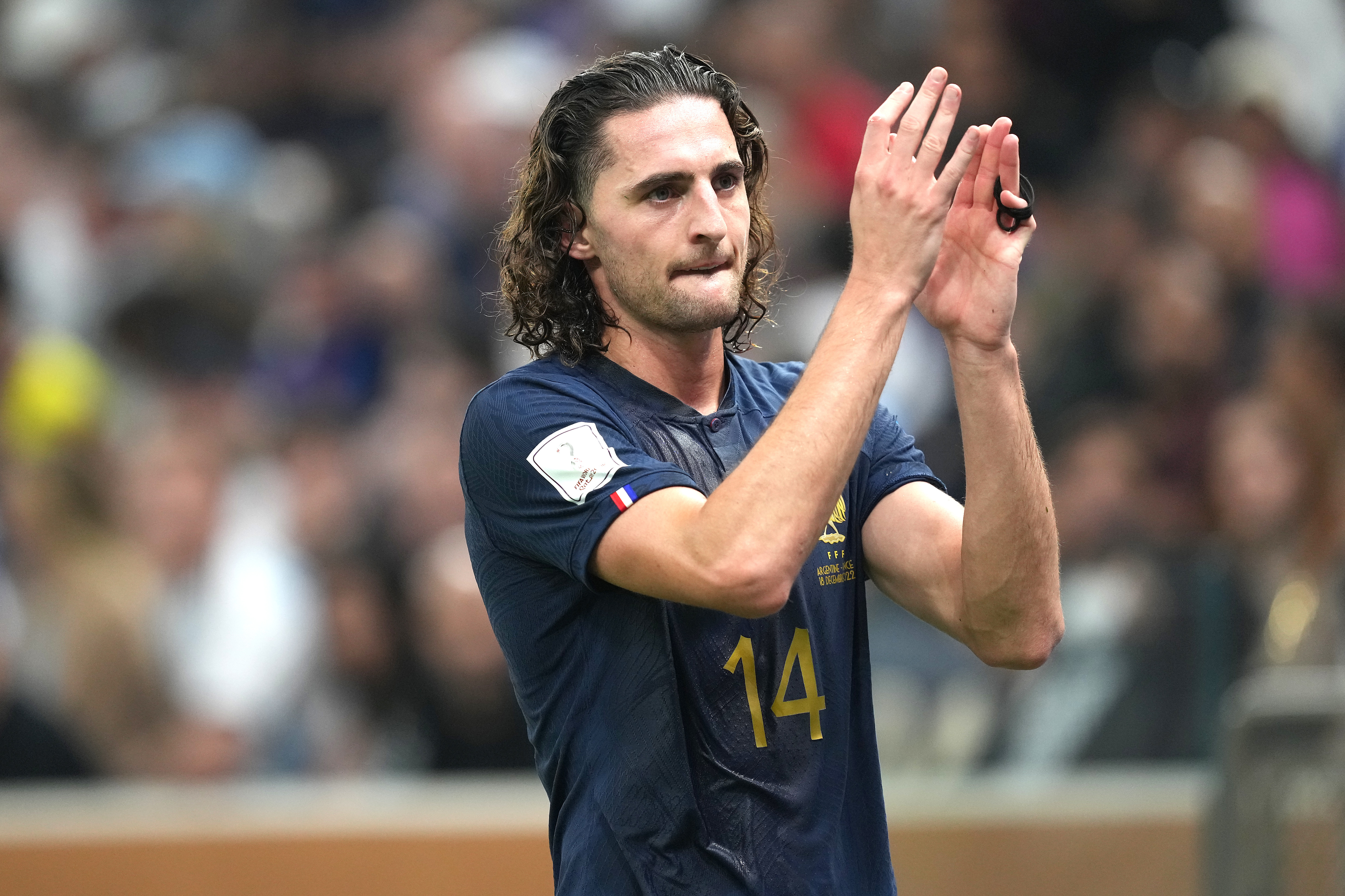 France’s Adrien Rabiot applauds the fans