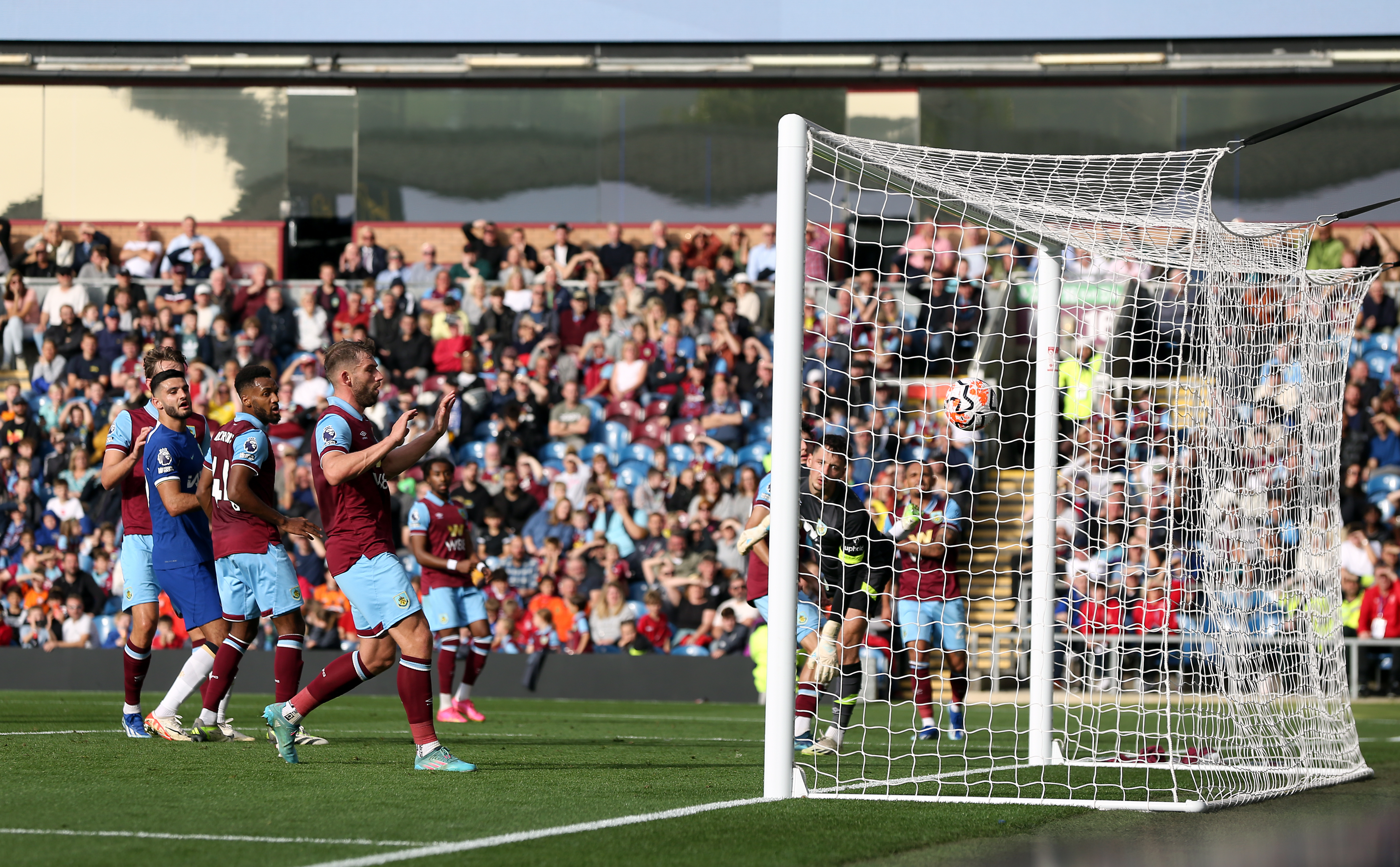 Chelsea were level when Ameen Al-Dakhil turned the ball into his own net