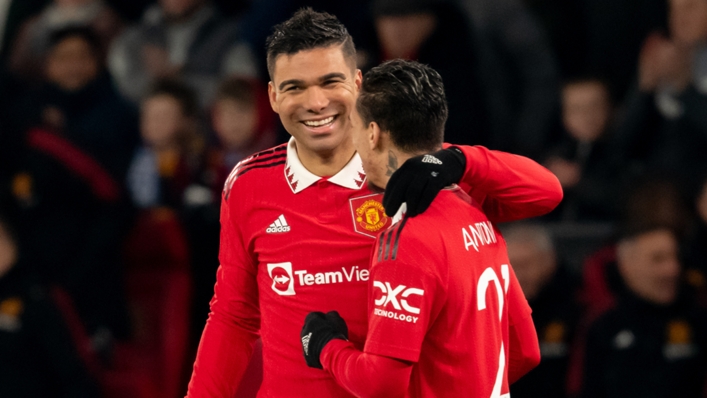 Casemiro hugs Antony during the win over Reading