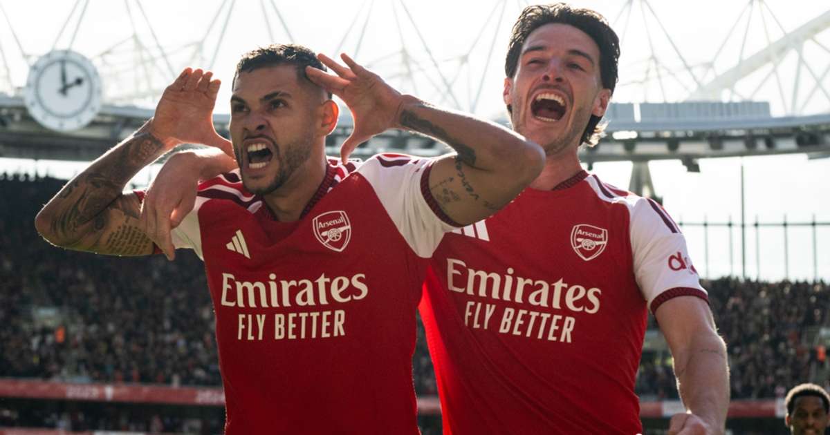 Arsenal players celebrate during their 2-1 Premier League win over Leeds United
