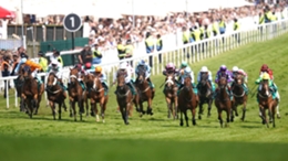 Runners and riders during the Aston Martin “Dash” Handicap (Heritage Handicap) during Derby Day of the 2023 Derby Festival at Epsom Downs Racecourse, Epsom. Picture date: Saturday June 3, 2023.