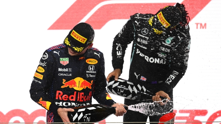Max Verstappen and Lewis Hamilton celebrate after the Qatar Grand Prix