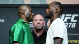Kamaru Usman (left) faces off against challenger Leon Edwards as UFC president Dana White watches on