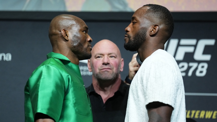 Kamaru Usman (left) faces off against challenger Leon Edwards as UFC president Dana White watches on