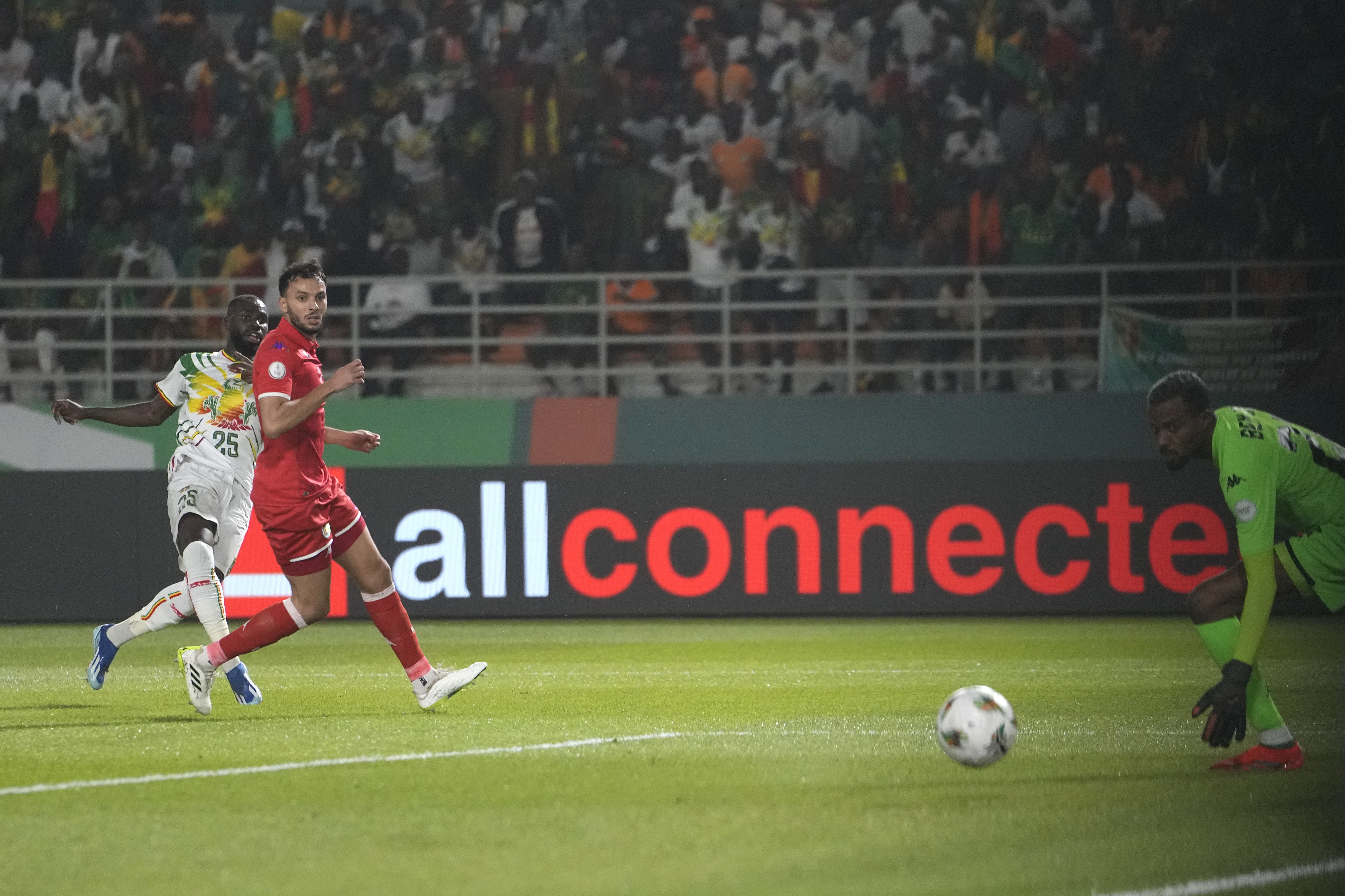 Mali’s Lassine Sinayoko scores against Tunisia (Sunday Alamba/AP)