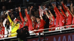 Bruno Fernandes and Harry Maguire hold the EFL Cup aloft after Manchester United's 2-0 win against Newcastle United