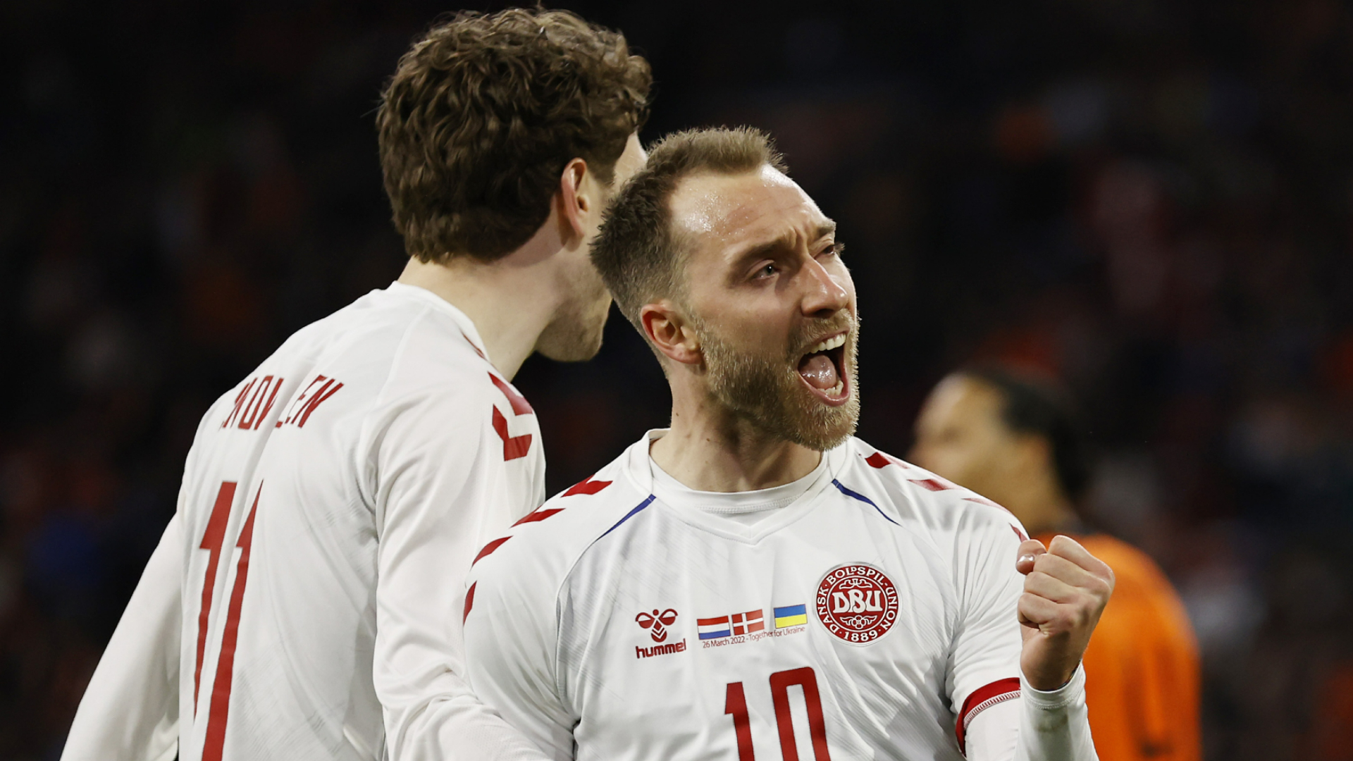 Christian Eriksen celebrates his goal against the Netherlands