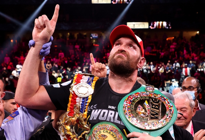 Tyson Fury knocked out Deontay Wilder in the 11th round of their trilogy fight to retain his belts in Vegas.