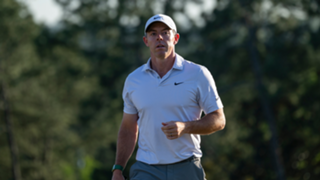 The Masters: McIlroy vows to 'keep swinging' after racing into record lead at Augusta