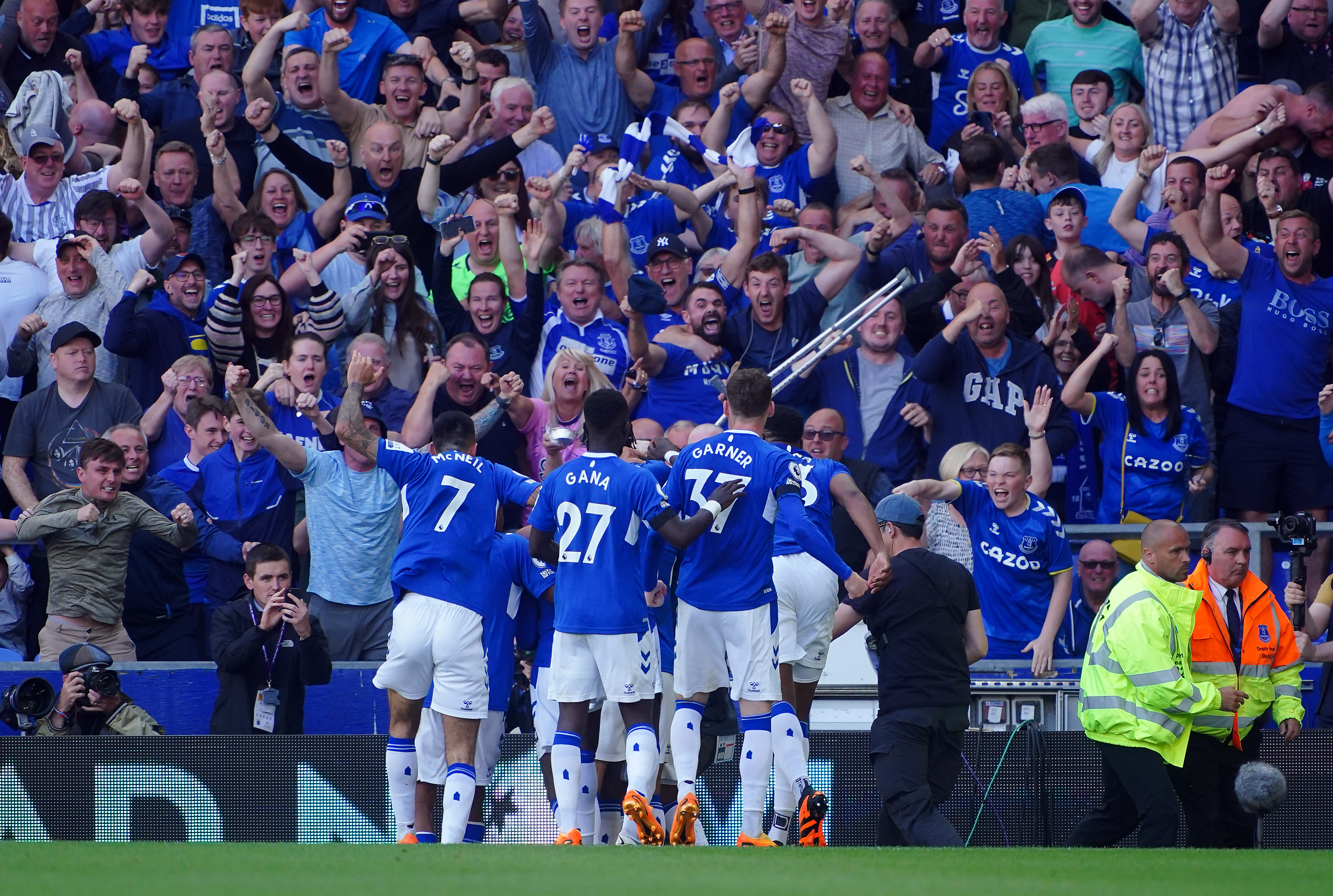 Everton players celebrate Abdoulaye Doucoure's winner against Bournemouth last month that secured their top flight status