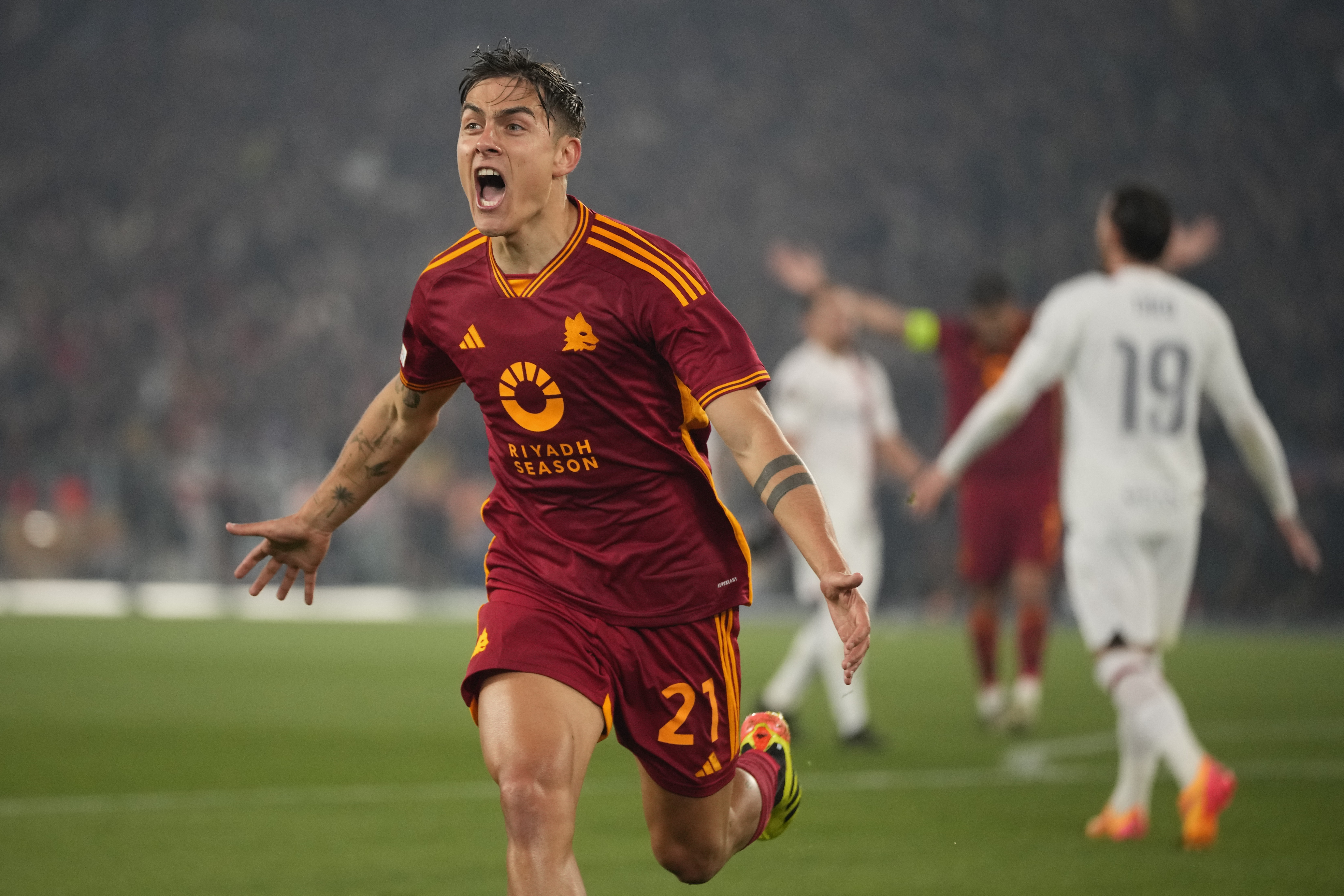 Roma’s Paulo Dybala celebrates after scoring