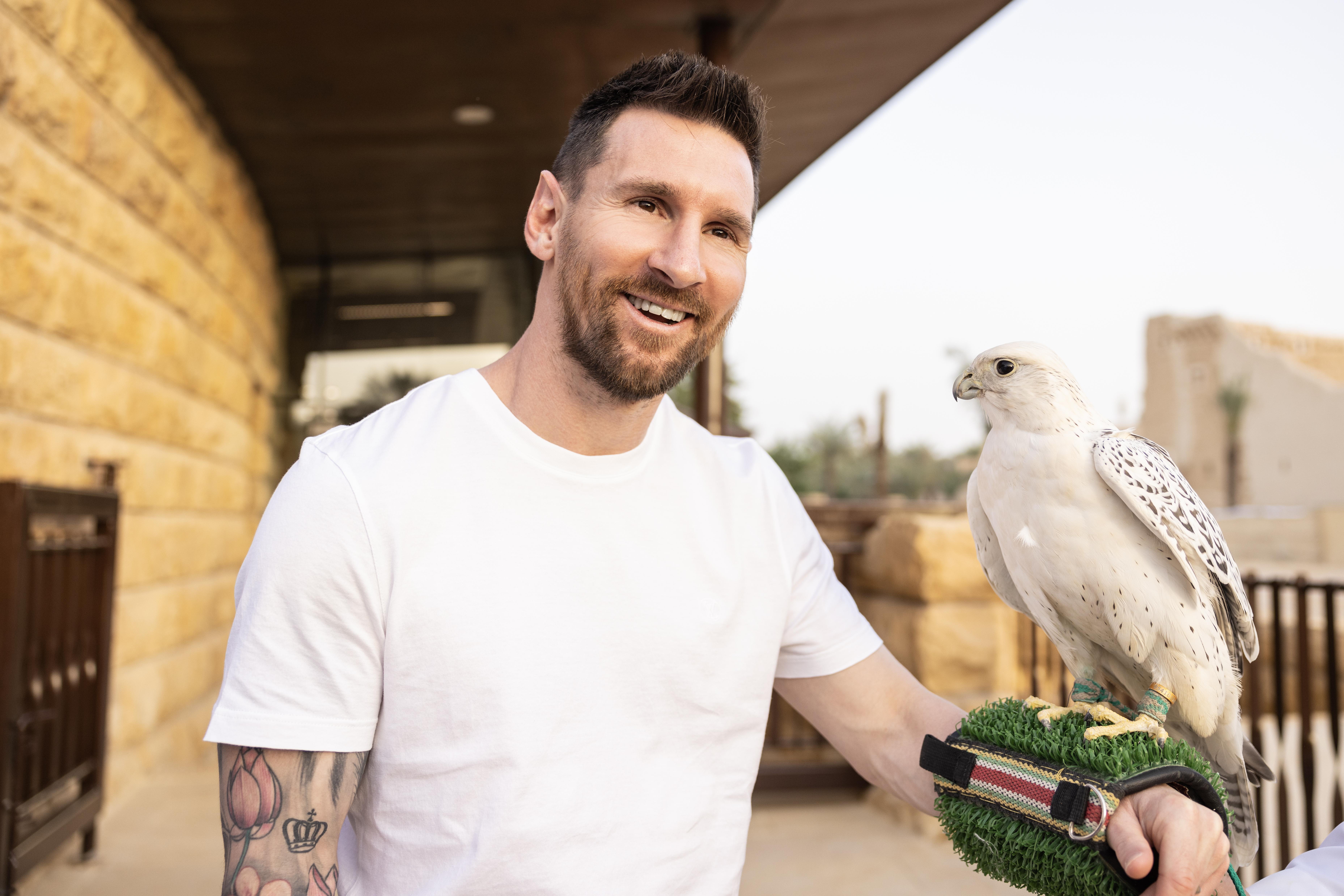 Lionel Messi with a white falcon at Diriyah