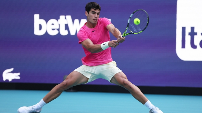 Carlos Alcaraz plays a backhand against Facundo Bagnis in their second round match